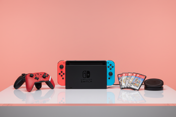 create a simple photo with a couple nintendo items that are currently sold and give it a light red background that looks like it was taken in a studio